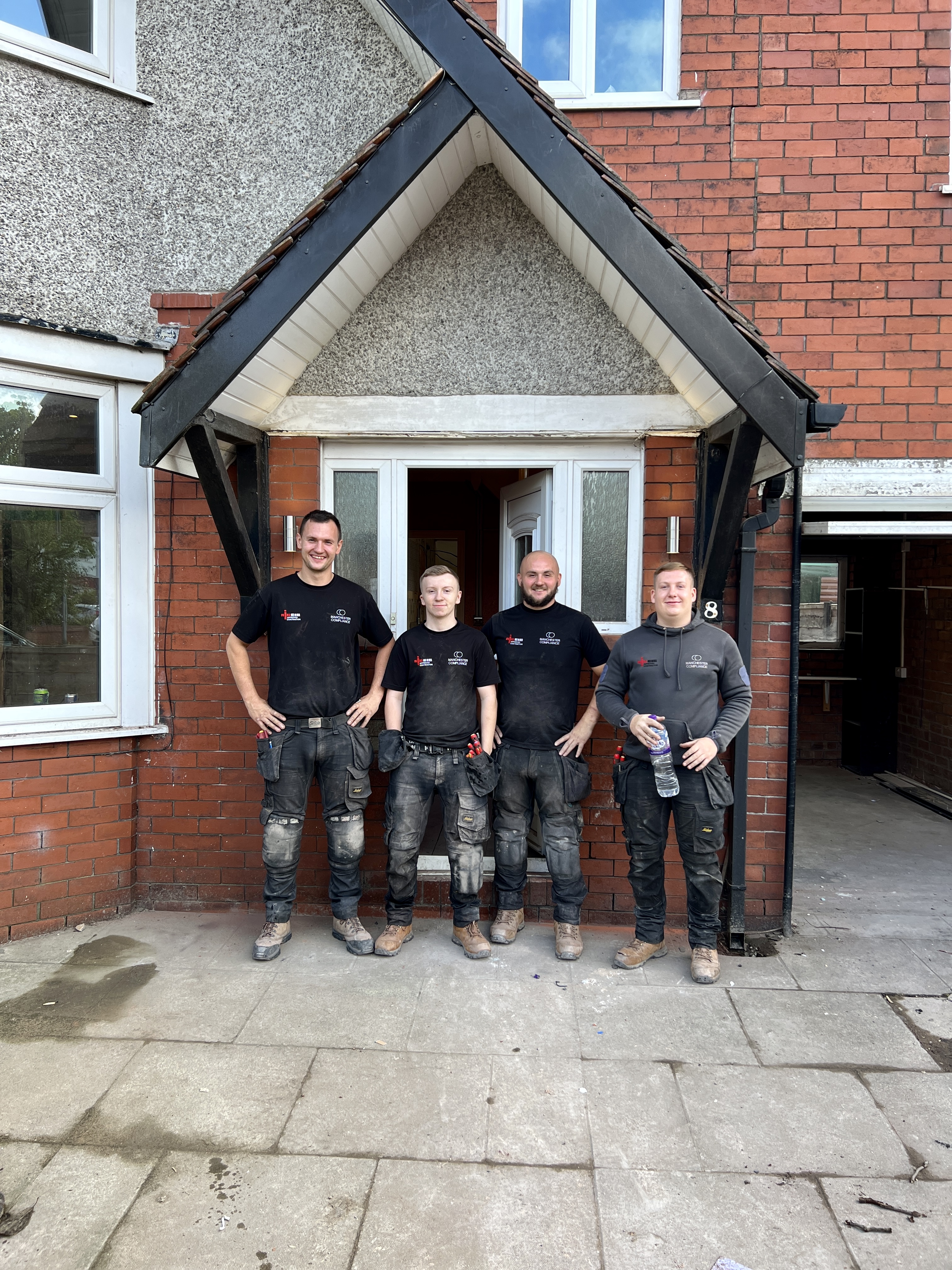 Manchester Compliance team outside an HMO property ready for fire risk assessment